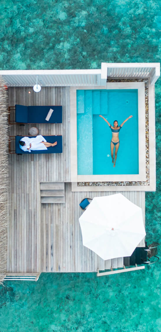 Overhead View Of A Luxurious Pool and Deck